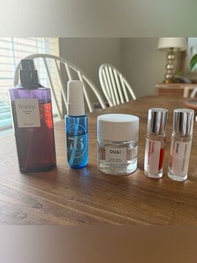 Assorted perfumes and body sprays ouai , dossier, sol de janeiro, finery